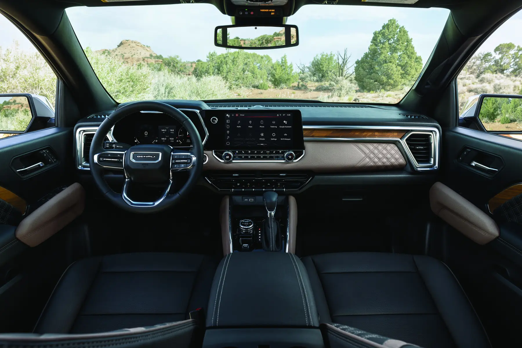 2027 GMC Canyon Denali interior in Jet Black and Teak with wood trim and 11.3 inch touchscreen