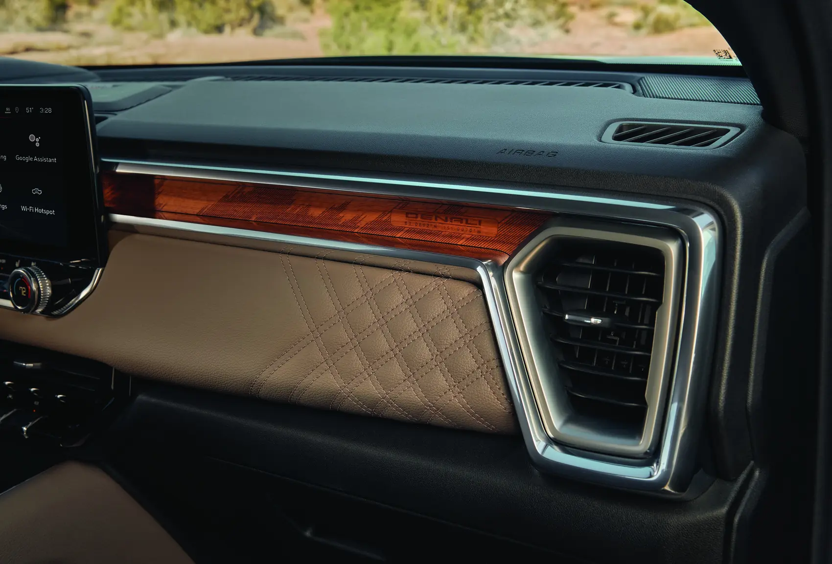 2027 GMC Canyon Denali wood dashboard inlay etched with the Denali coordinates