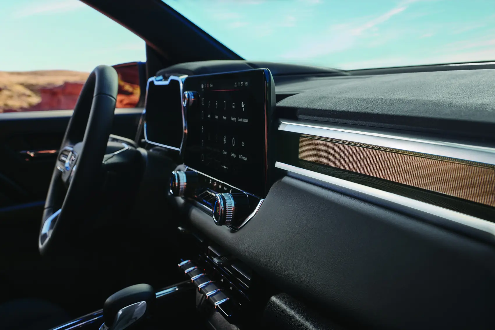 2027 GMC Canyon Elevation Jet Black interior center touchscreen detail