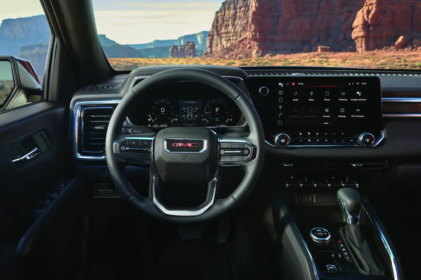 2027 GMC Canyon Elevation Jet Black interior showing driver display and center touchscreen