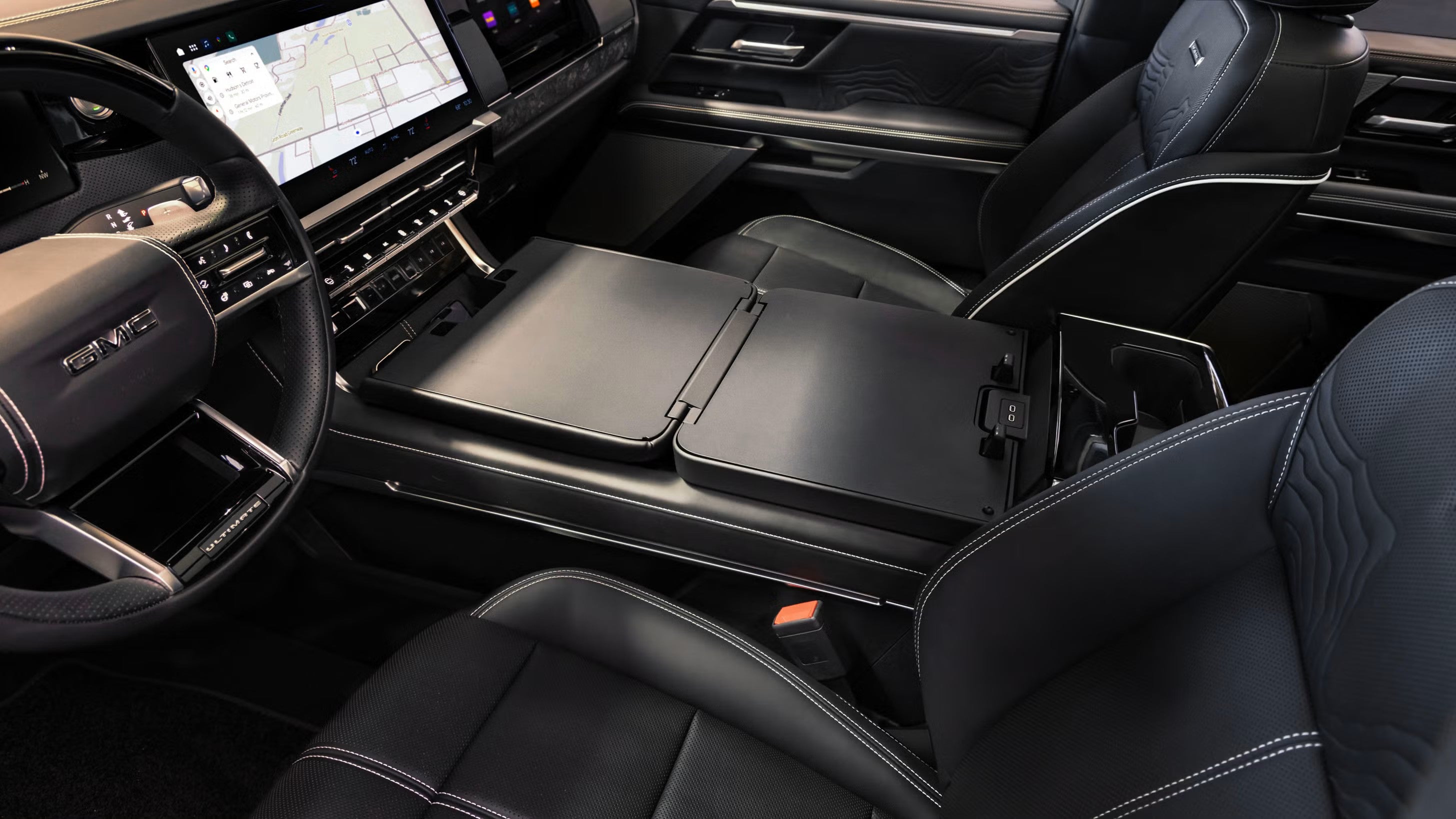 2027 GMC Sierra 1500 MultiPro center console folded flat to a work surface