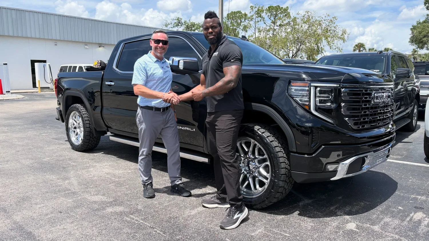 Charles taking delivery of his Sierra 1500 Denali Ultimate build from Mr. Supreme T at Rivard Buick GMC
