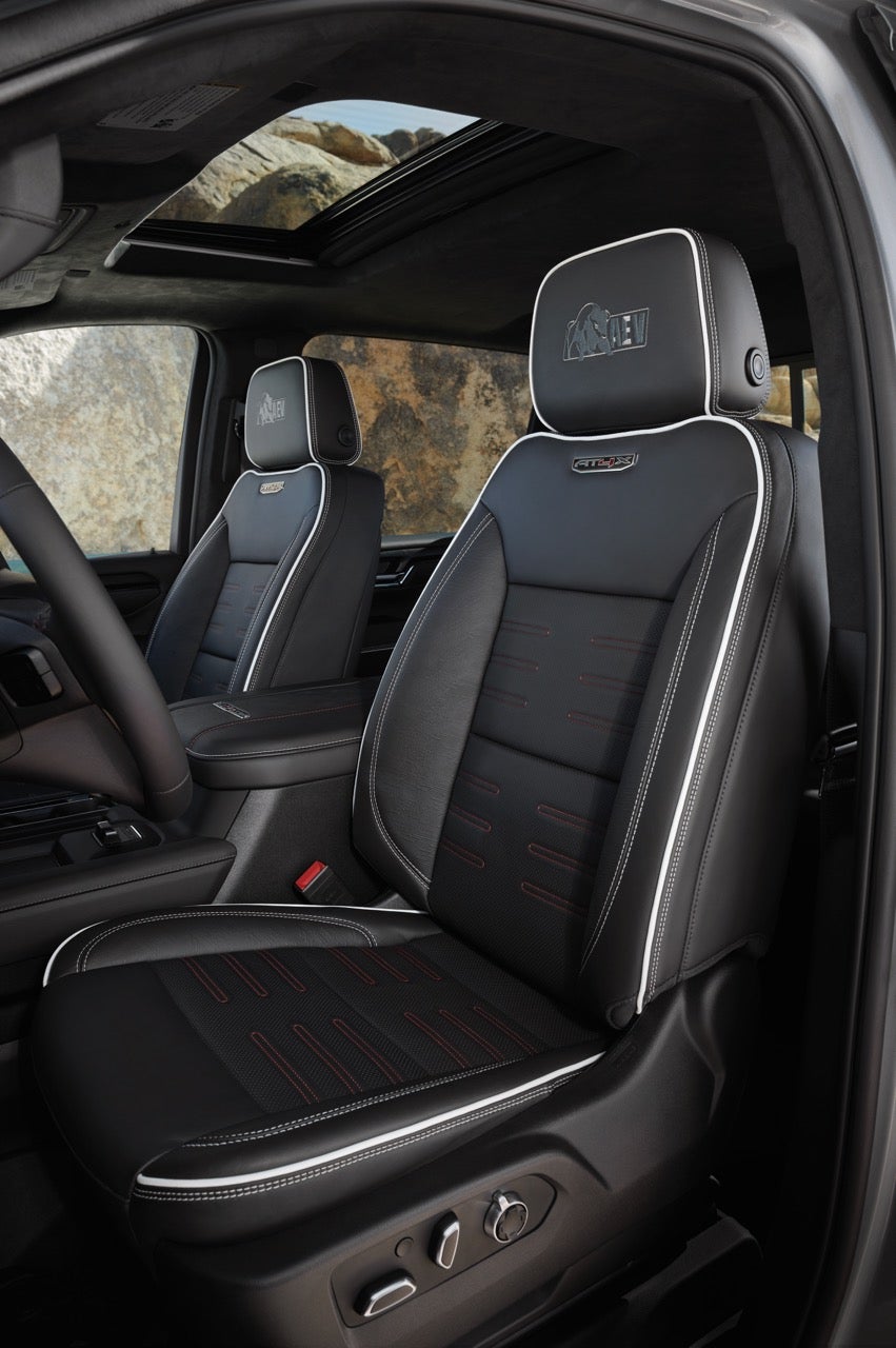 2027 GMC Sierra HD AT4X AEV Edition front seats with embroidered headrests