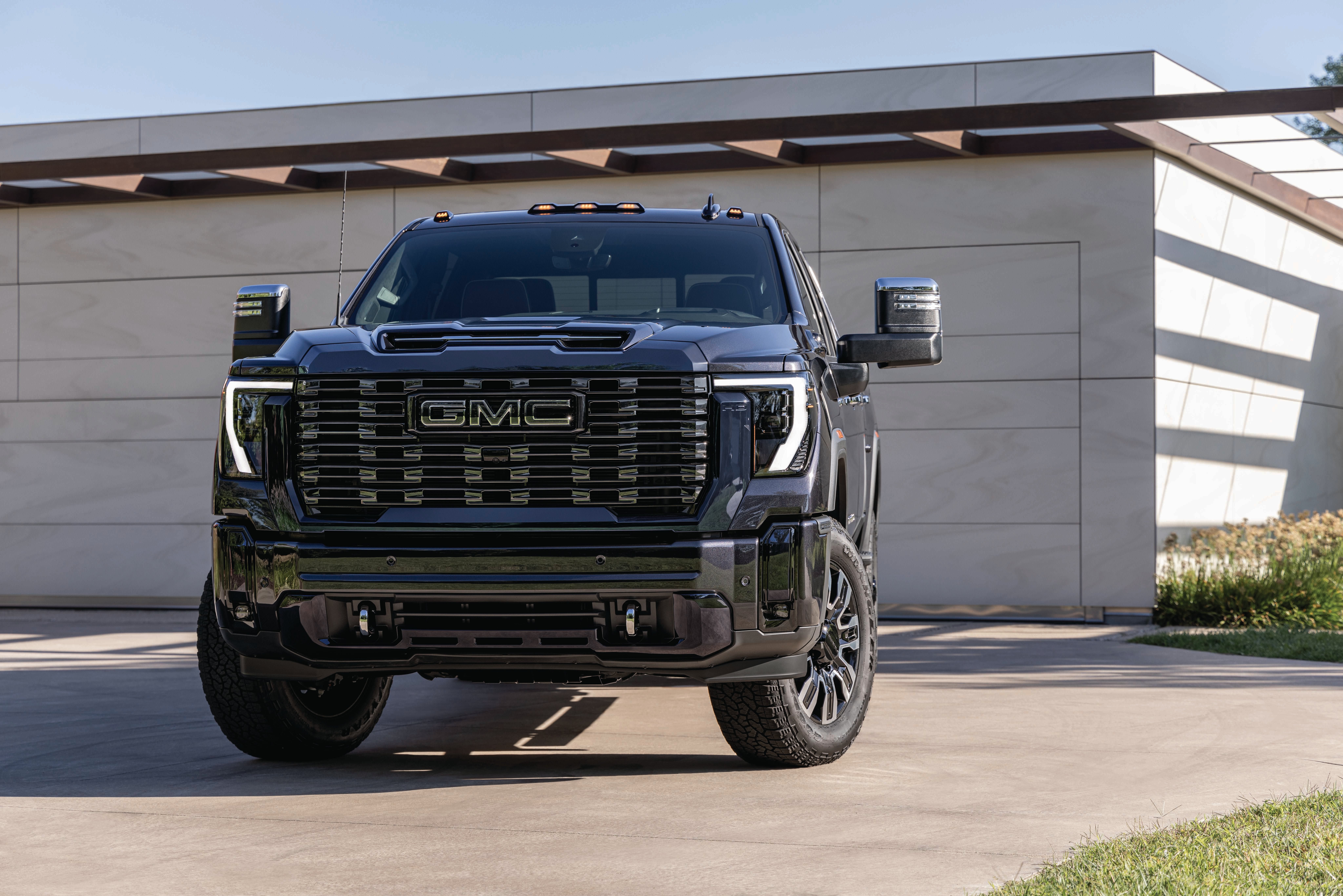 2027 GMC Sierra 2500HD Denali Ultimate front view with gloss black grille